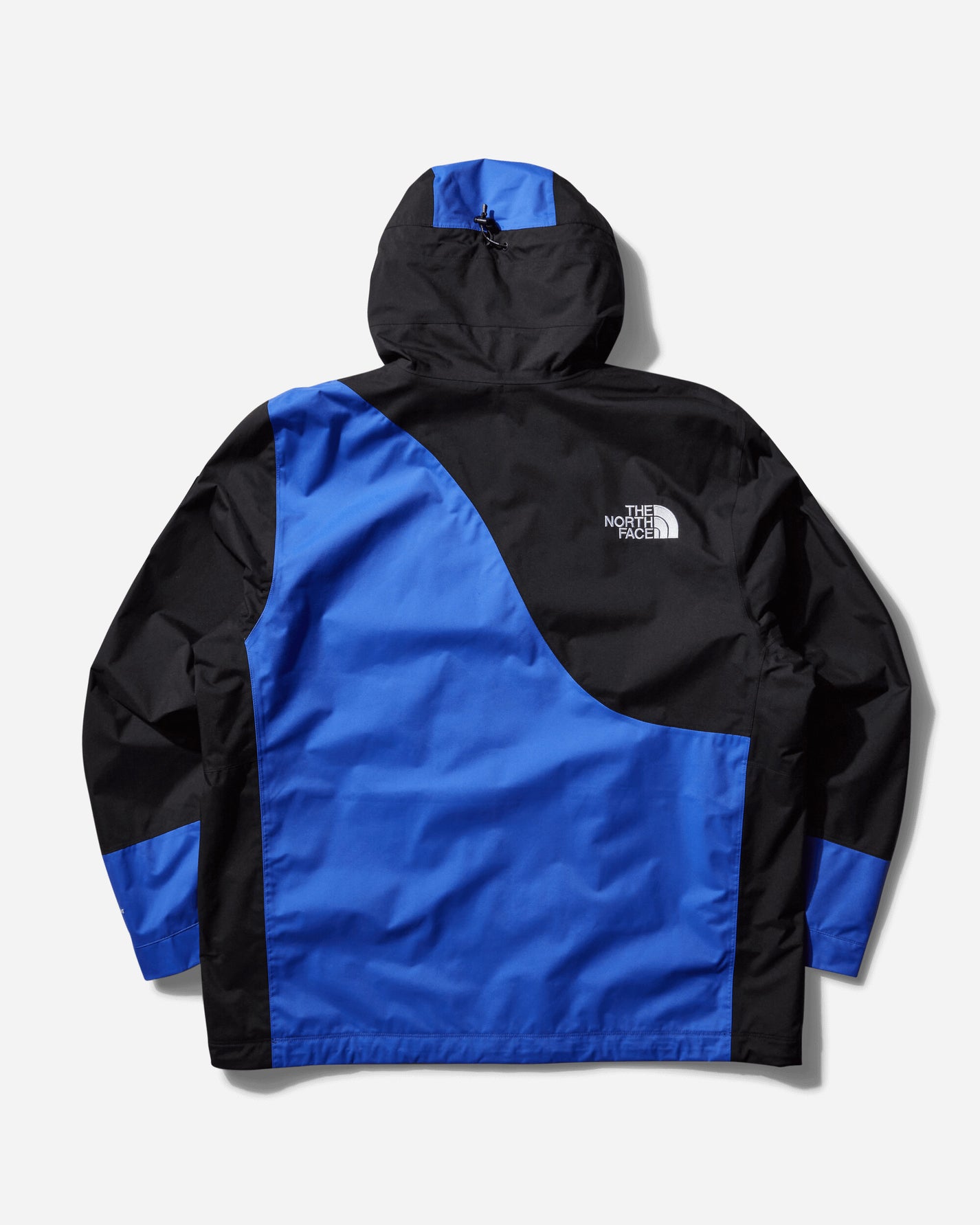 The North Face M Tnf X Yinka Ilori 2L Rainshell Jacket Tnf Black/Solar Blue Coats and Jackets Jackets NF0A89GQ TMI